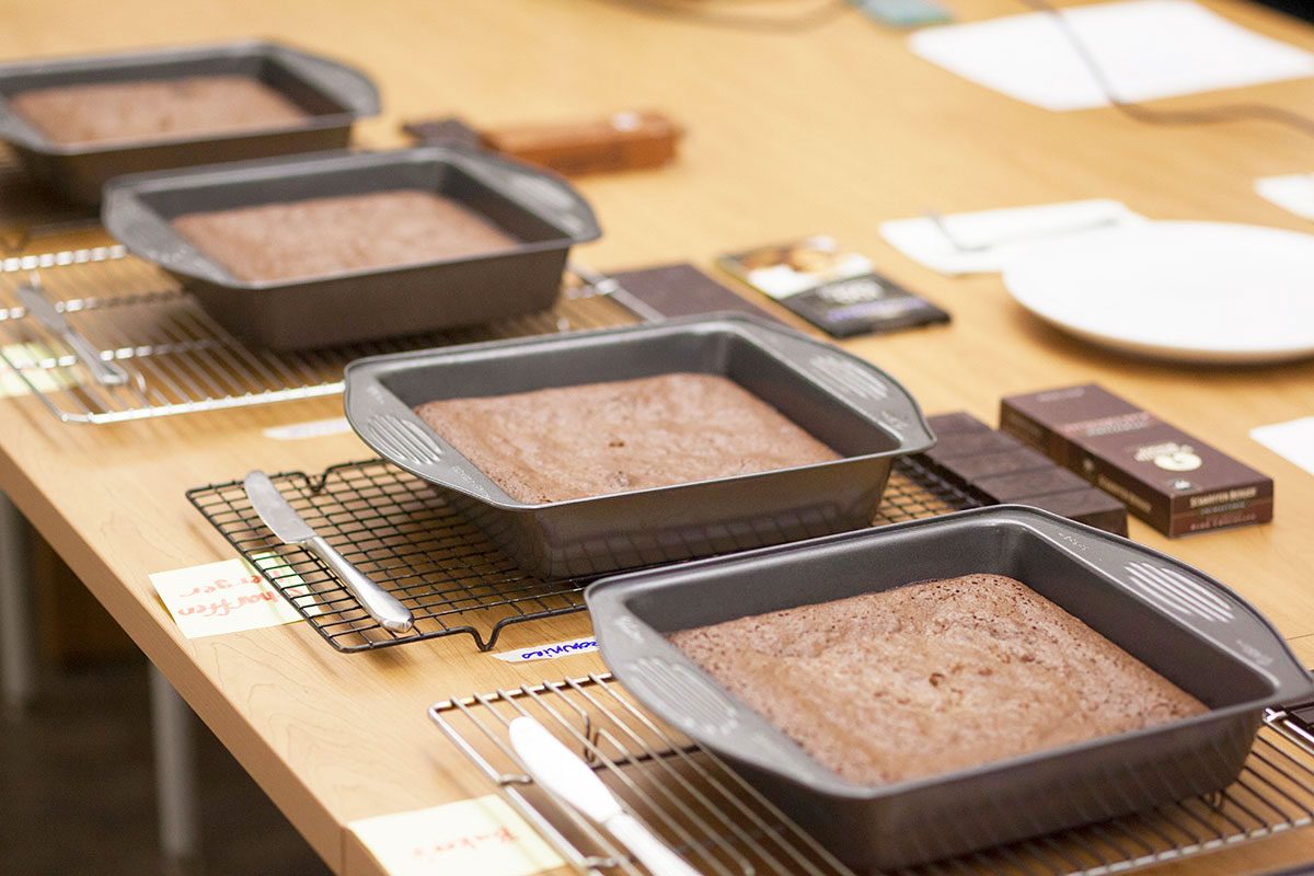 Line up of brownies in their pans