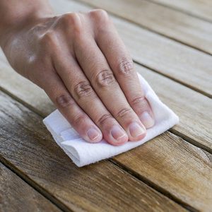 Impregnate wooden table with oil