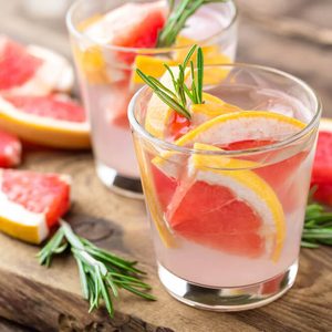 Refreshing drink, grapefruit and rosemary cocktail; infused vodka