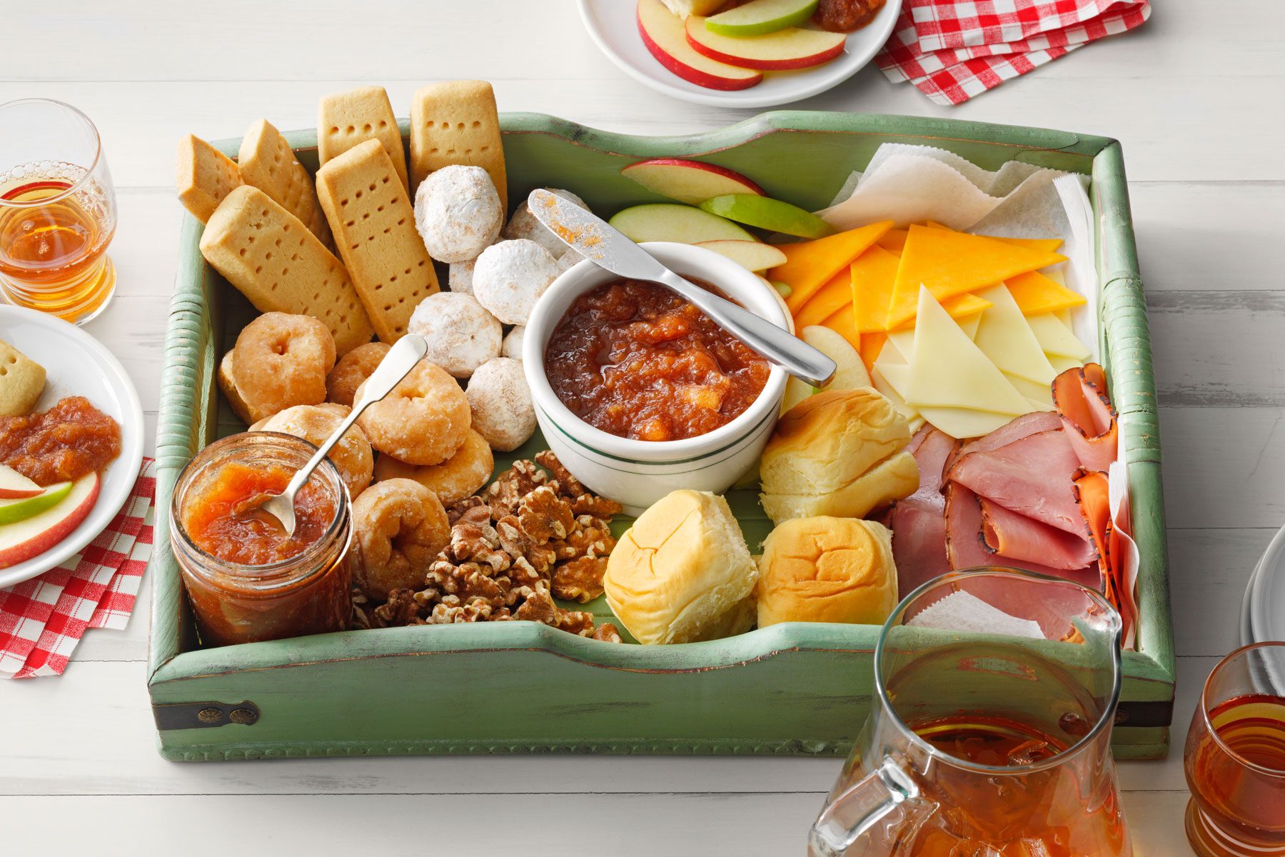 Apple Butter in a green tray with other breads