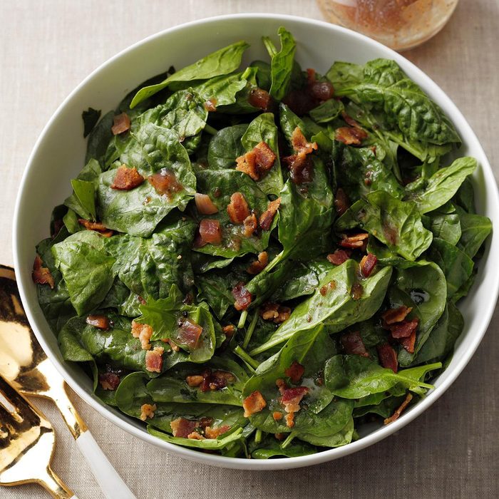 Hearty spinach salad with hot bacon dressing