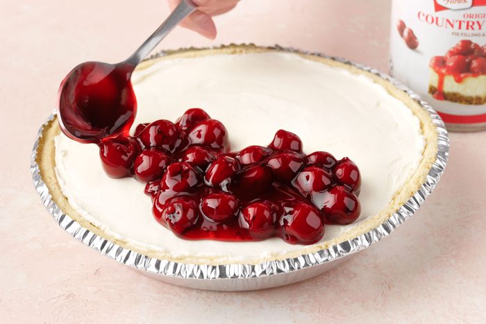 No Bake Cherry Cheesecake adding cherry filling