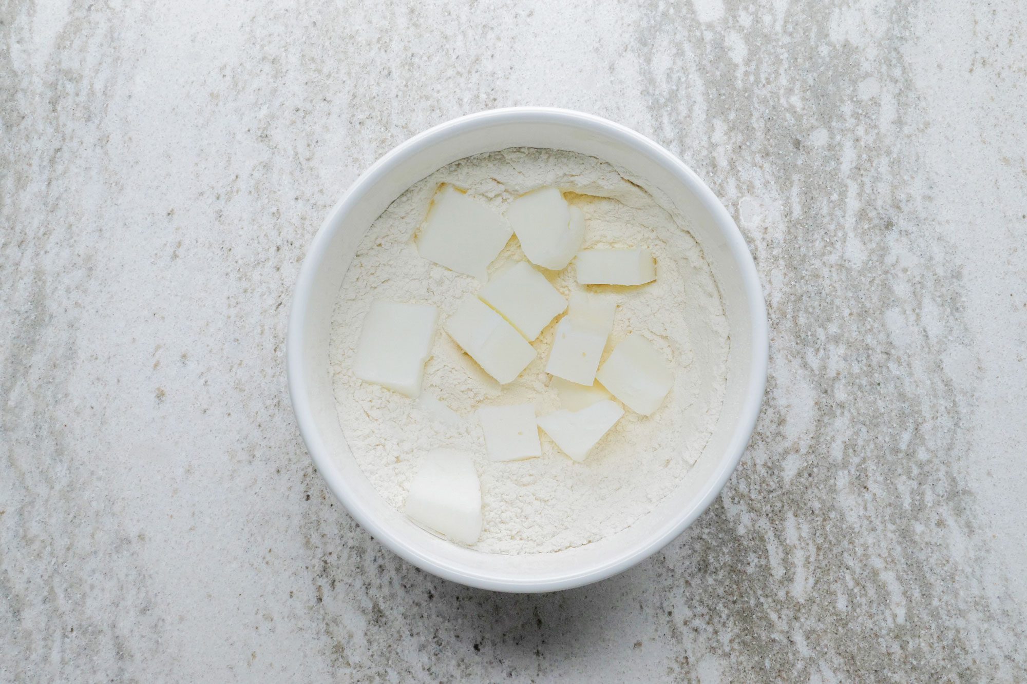 Whisk flour and salt in large bowl