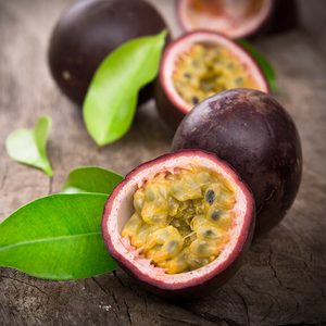 Passion fruits on wooden background