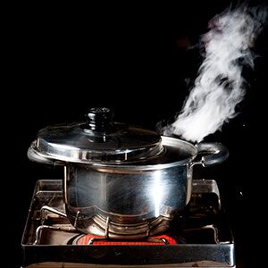 steam over cooking pot