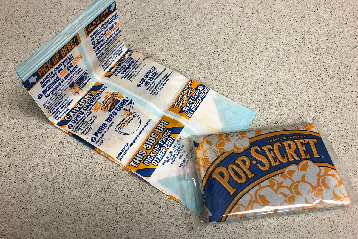 The Real Reason You Need to Microwave Popcorn “This Side Up”