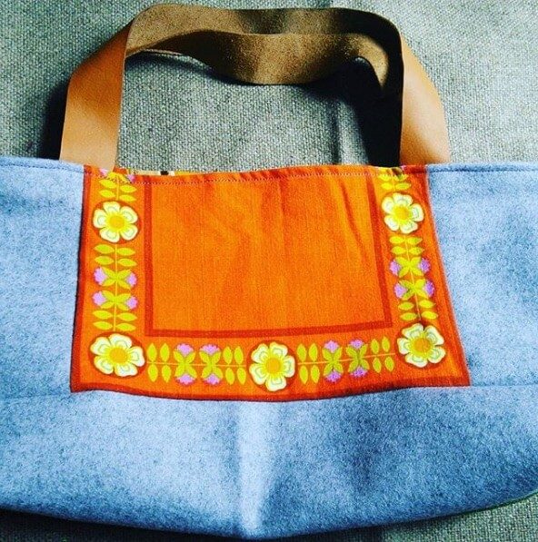 denim bag with a bright, vintage napkin