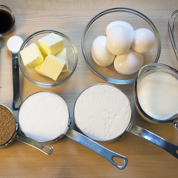 Baking Ingredients on Wooden Board;