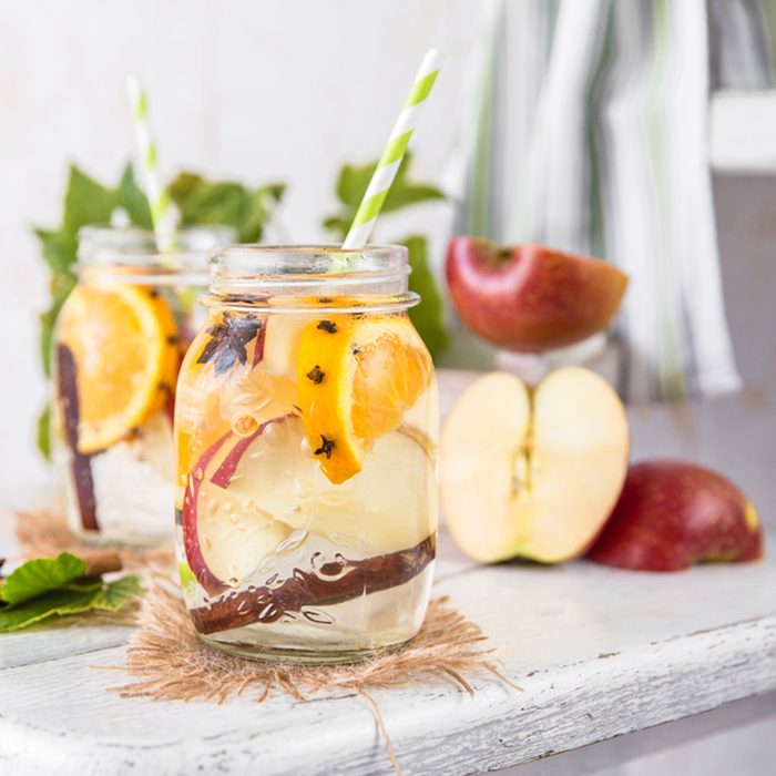 Cold Fruit Christmas Infused Detox Water with apple, orange, cinnamon and clove spice