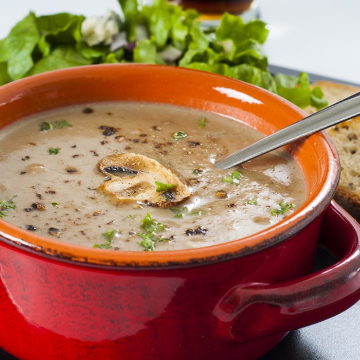Creamy wild mushroom soup diner with garlic toast