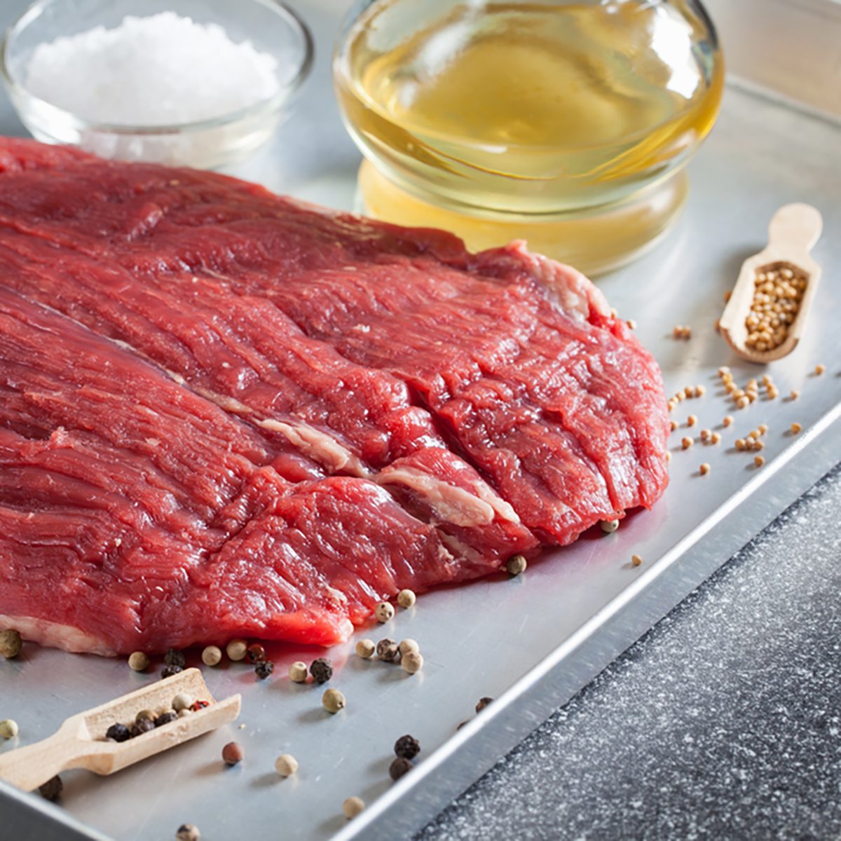 Raw ingredients for cooking flank steak