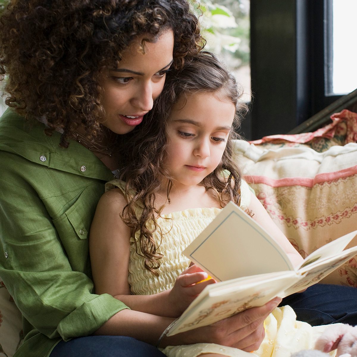 Mother and daughter reading