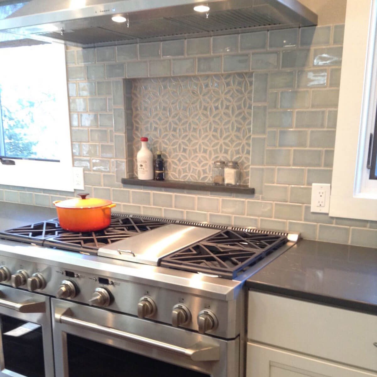 Monochromatic grey tile backsplash
