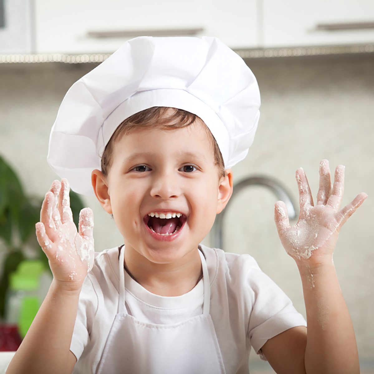 funny kid with flour