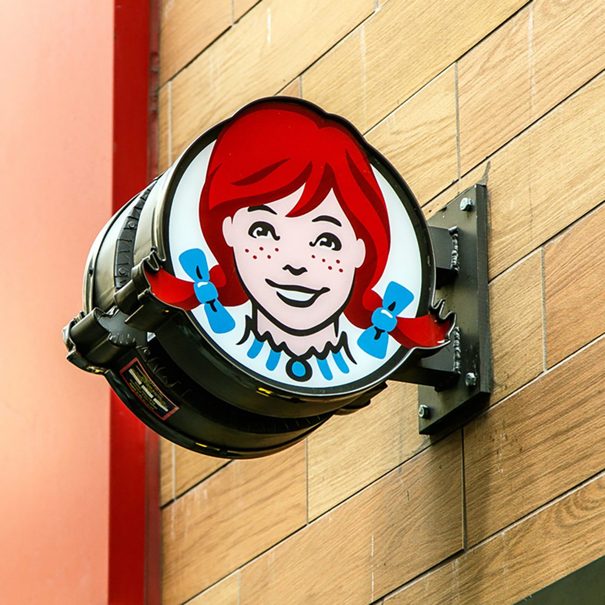 The sign above an entrance to a Wendy