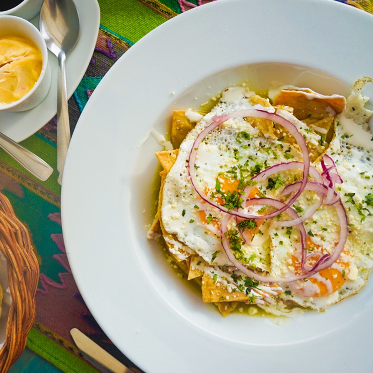 Traditional Mexican Mexico Breakfast of Chilequilas, Eggs, Bread