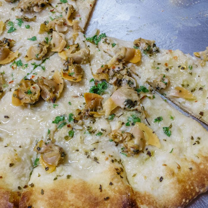 Closeup of clam pizza