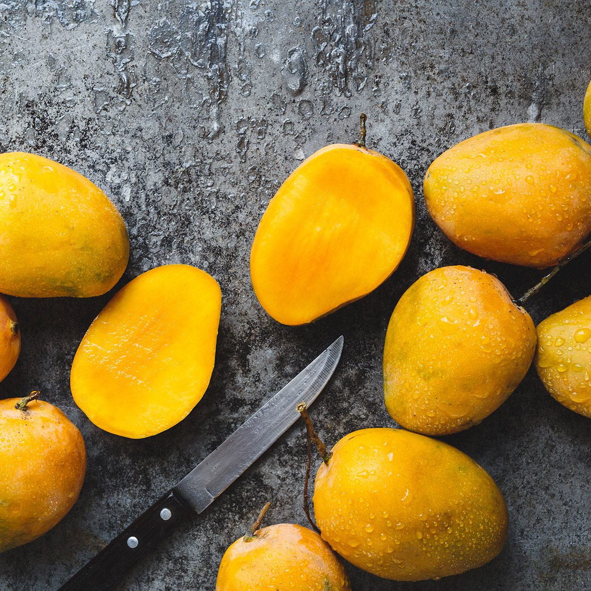stone fruit High Angle View Of Mangoes In Bowl On Table