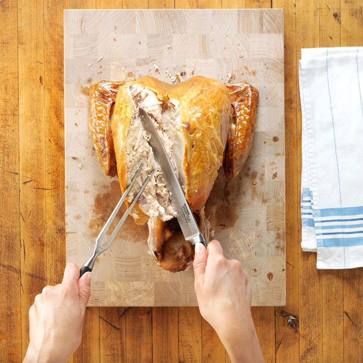 Carving a turkey removing a breast