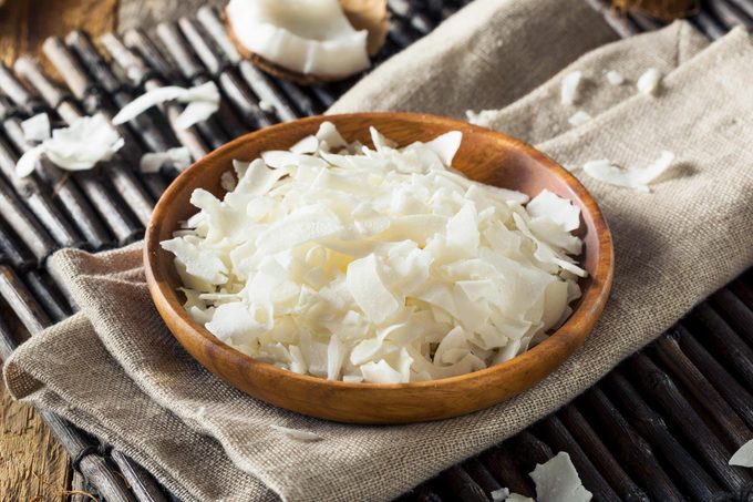 Coconut Flakes in a wooden bowl