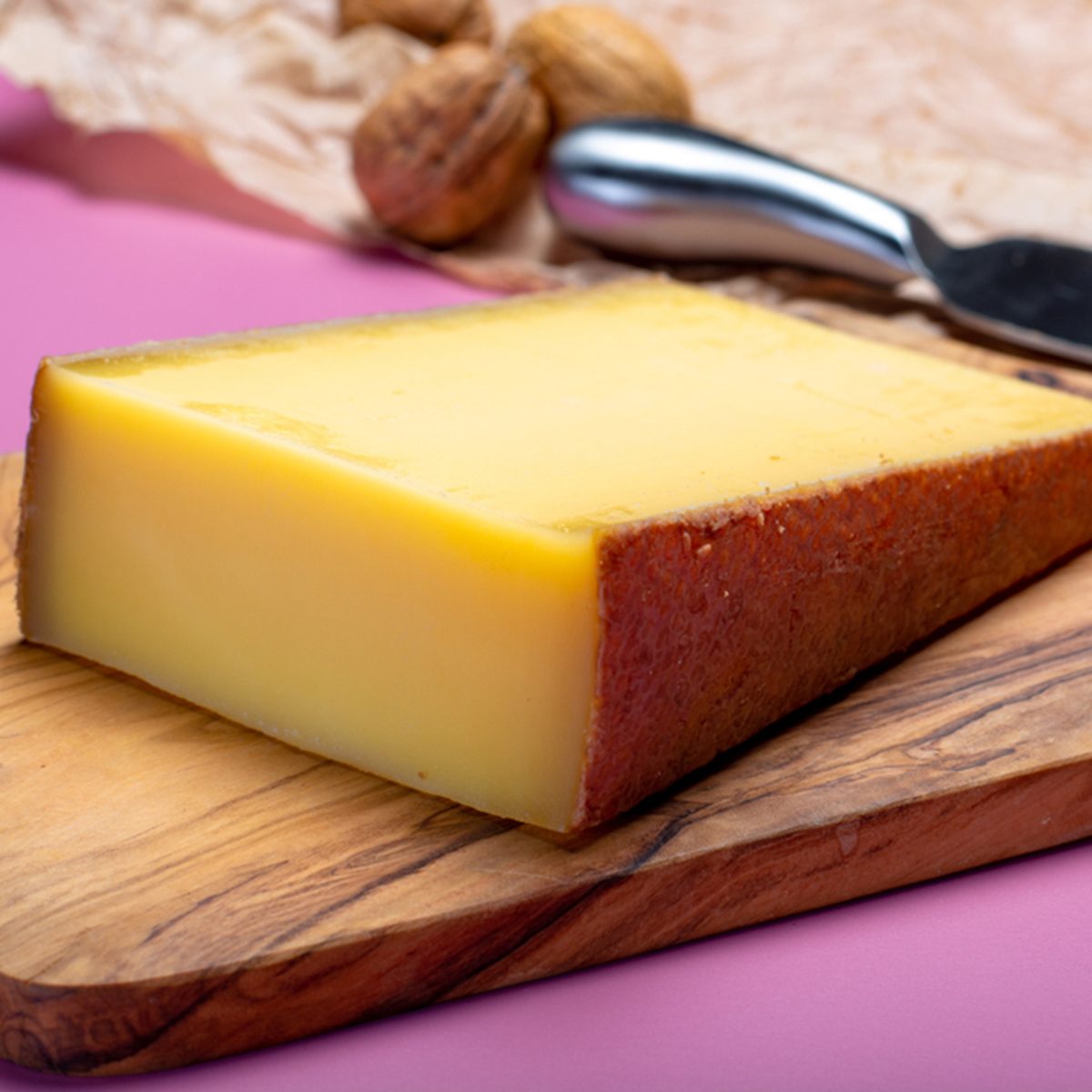 Piece of aged Comte or Gruyere de Comte, AOC French cheese made from unpasteurized cow