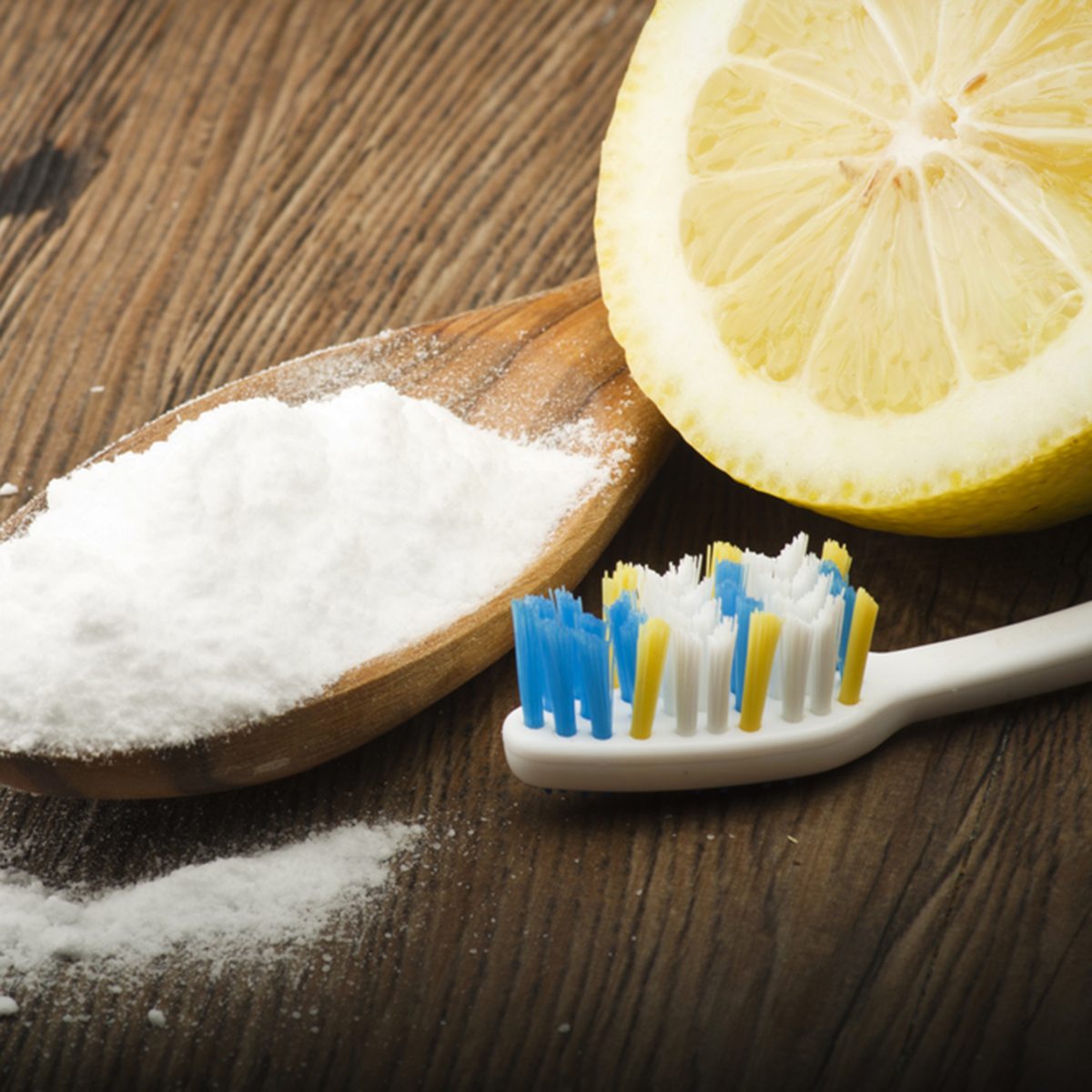 white teeth with lemon and baking soda.