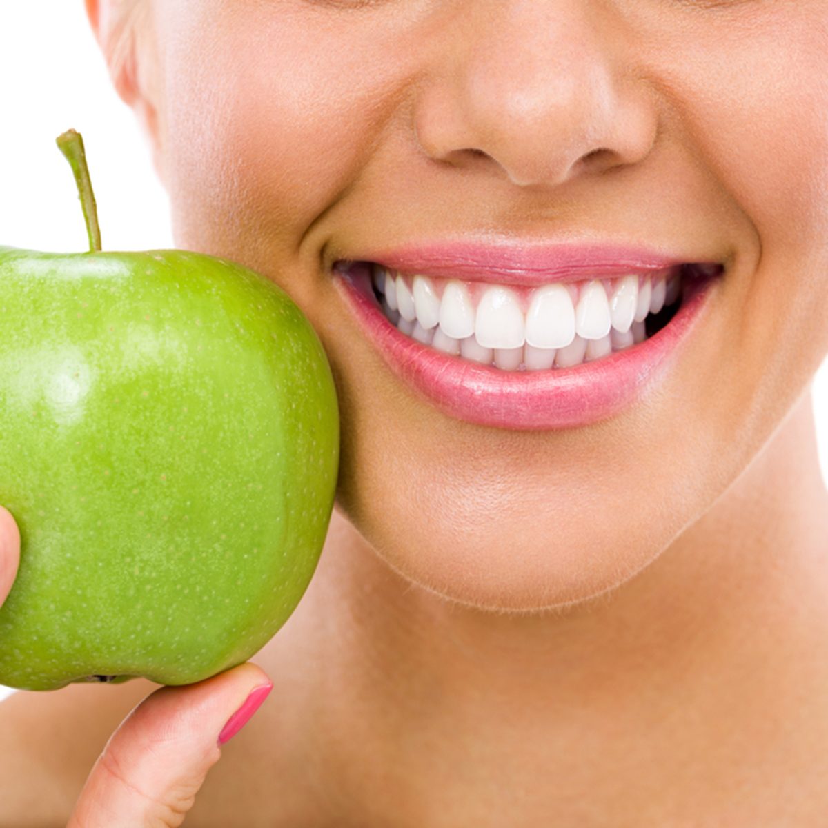 healthy teeth and green apple