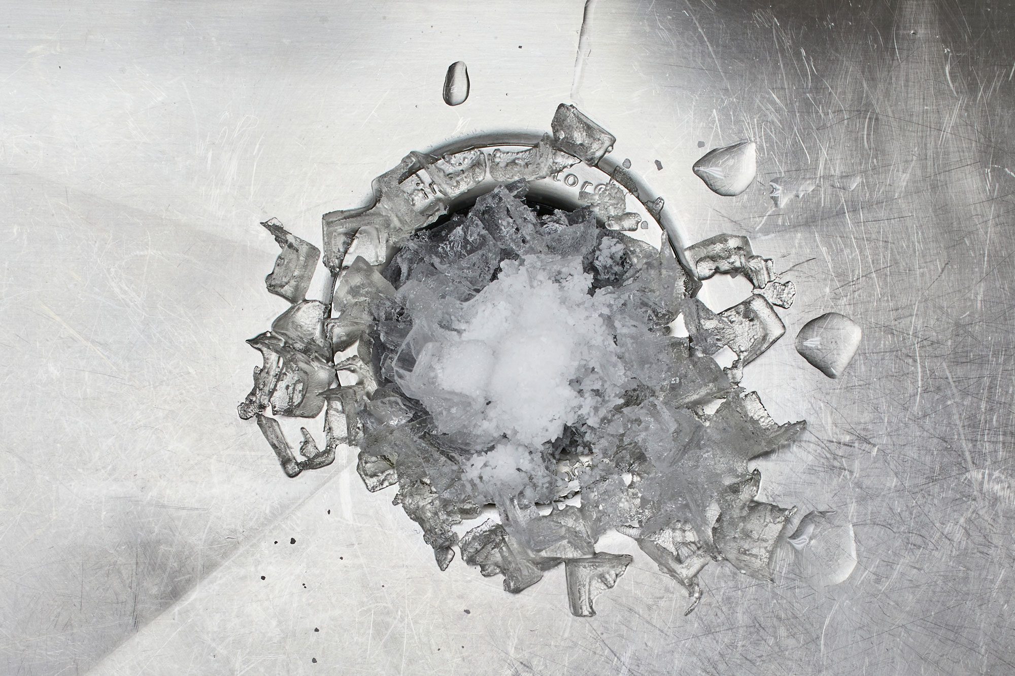 Ice And Salt To Clean Garbage Disposal