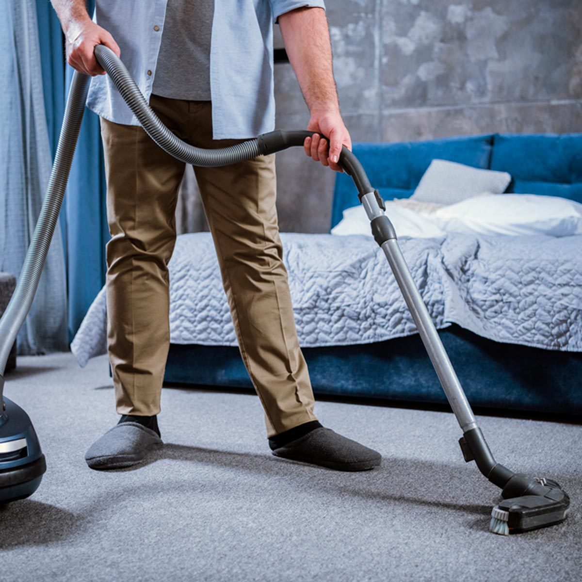 Vacuuming bedroom