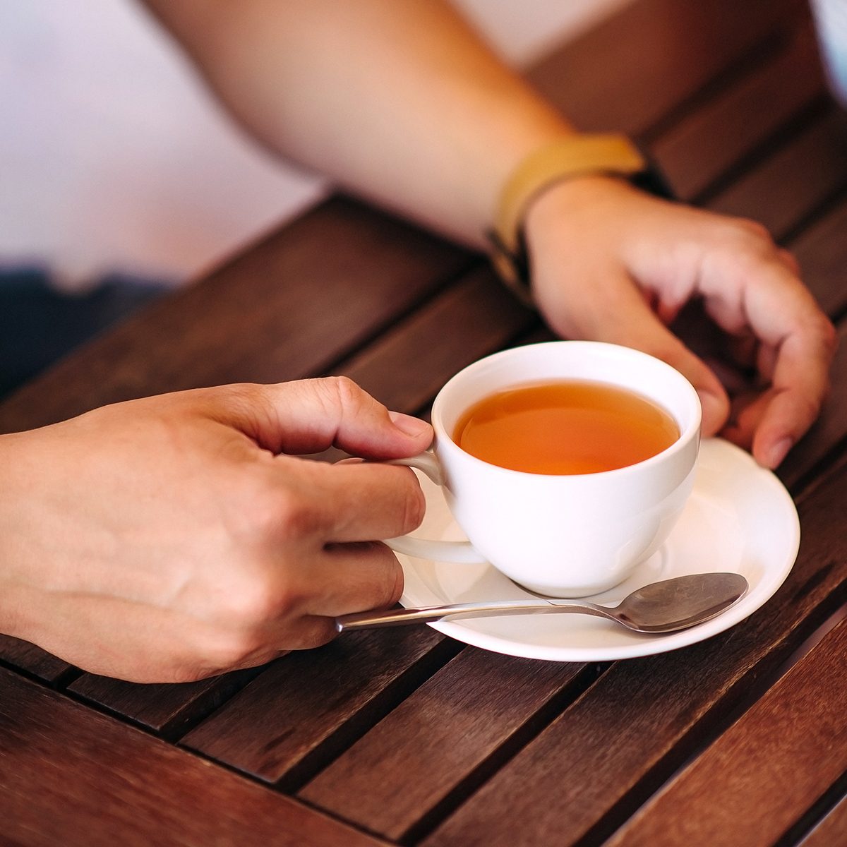 Close-up male hands holding a cup of tea; Shutterstock ID 419110399; Job (TFH, TOH, RD, BNB, CWM, CM): Taste of Home