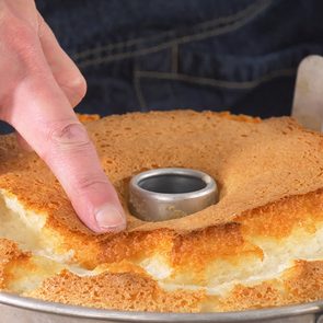 Testing a sponge cake for doneness