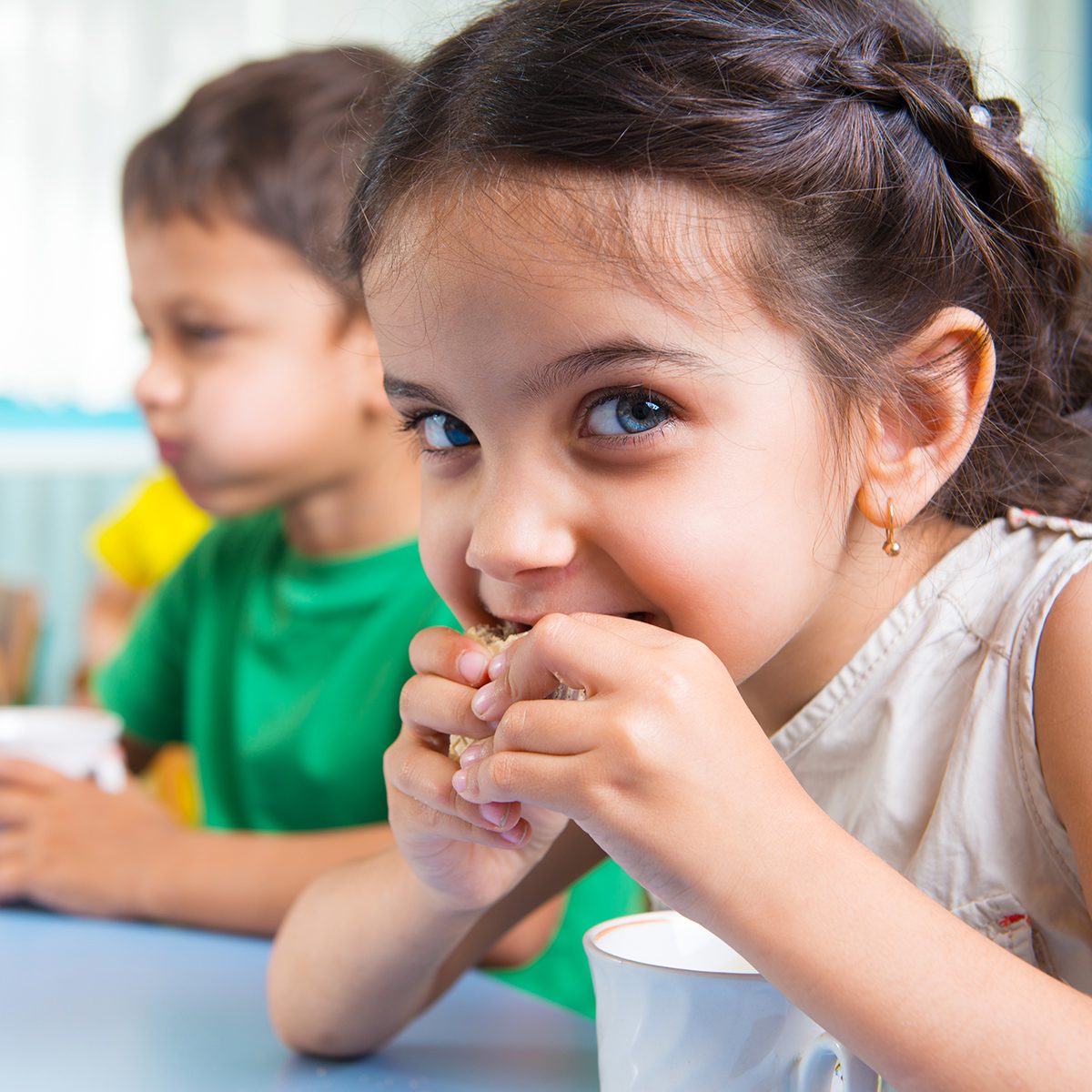 Cute little children drinking milk at daycare; Shutterstock ID 140863186; Job (TFH, TOH, RD, BNB, CWM, CM): Taste of Home