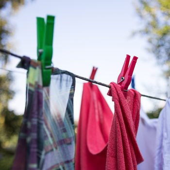 drying colorful clothes outside