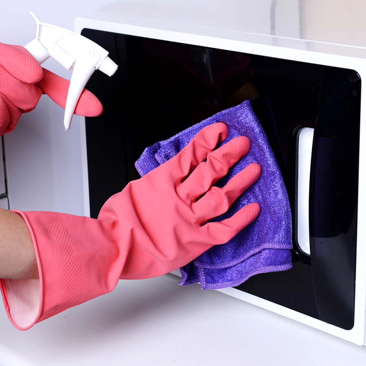 Wiping down a microwave