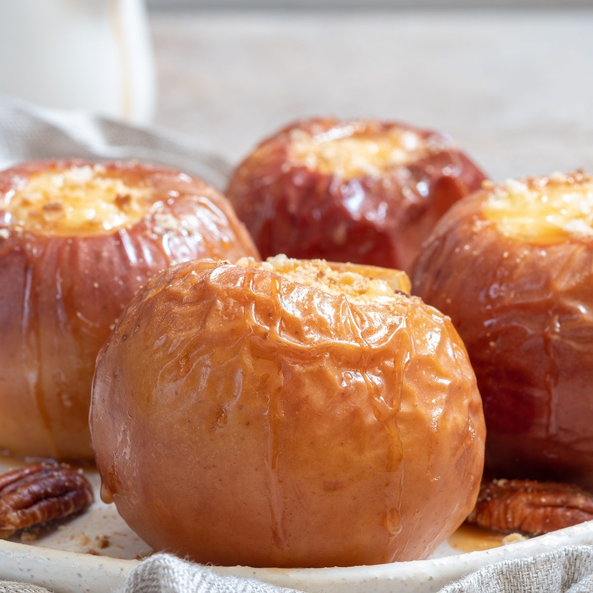 Baked apples stuffed with cheesecake and caramel; Shutterstock ID 1192631479; Job (TFH, TOH, RD, BNB, CWM, CM): TOH