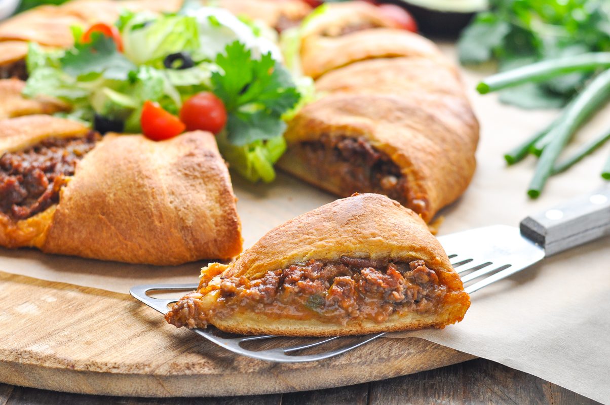 Taco crescent ring with a slice removed