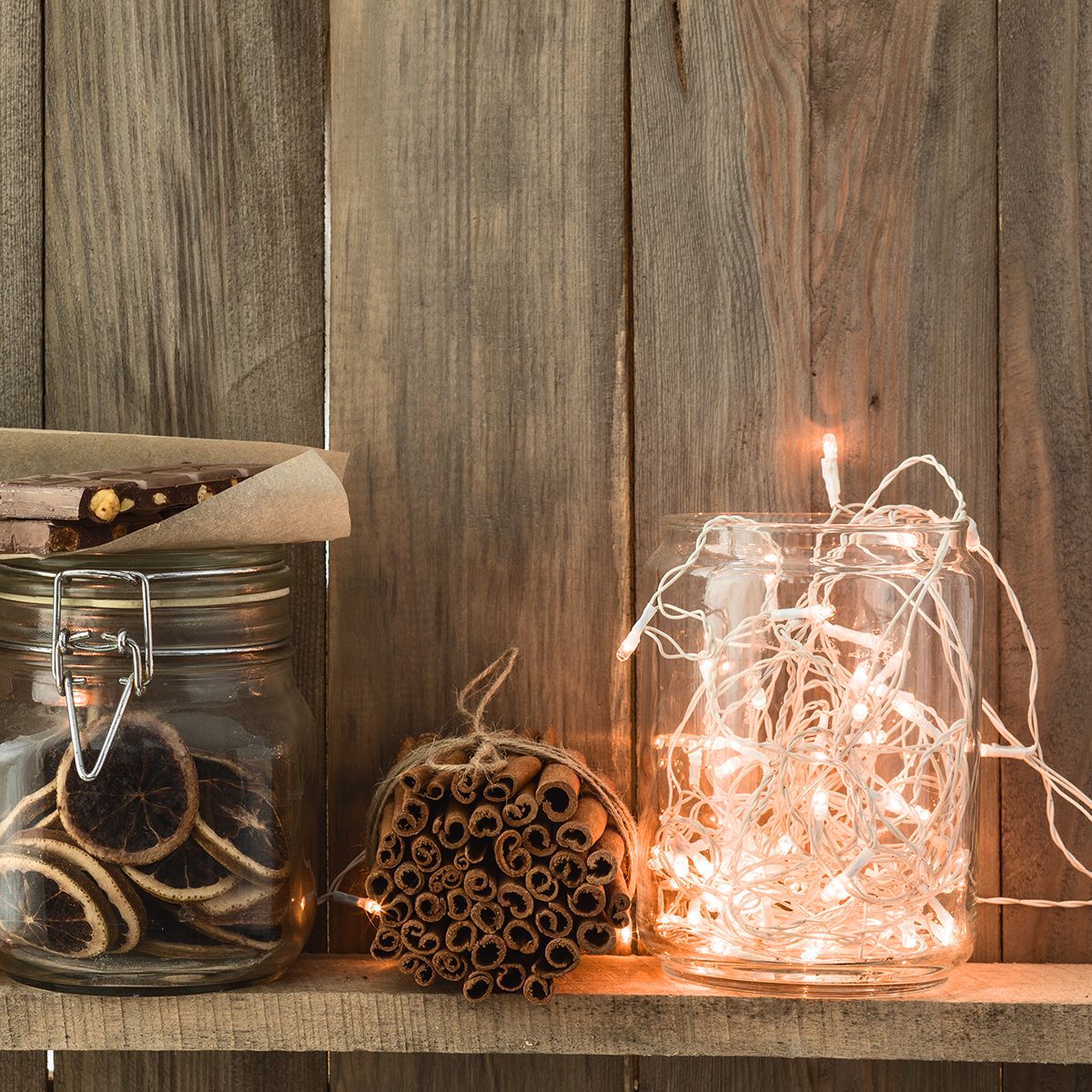 Sweet home. White Christmas decor on vintage natural wooden background. 