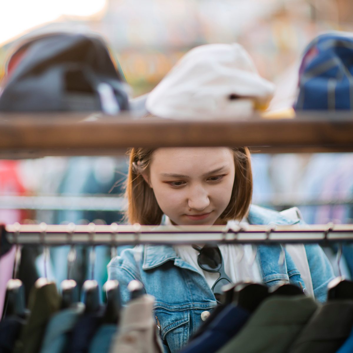 Teenager shopping at a flea market