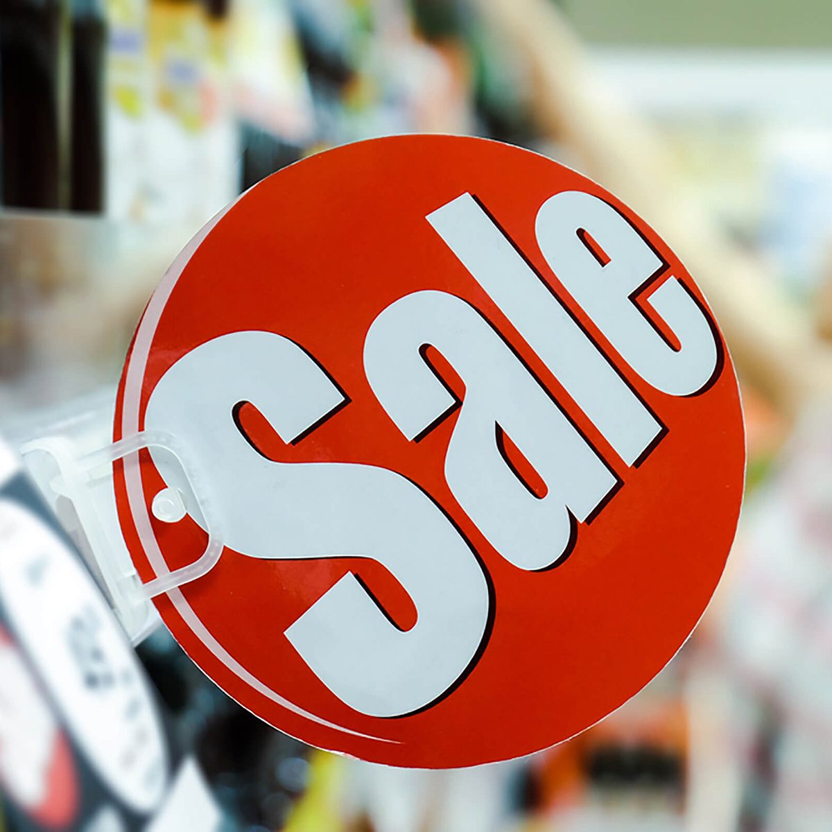 Supermarket on Sale, a woman is shopping in the Background.; Shutterstock ID 307399514; Job: RD