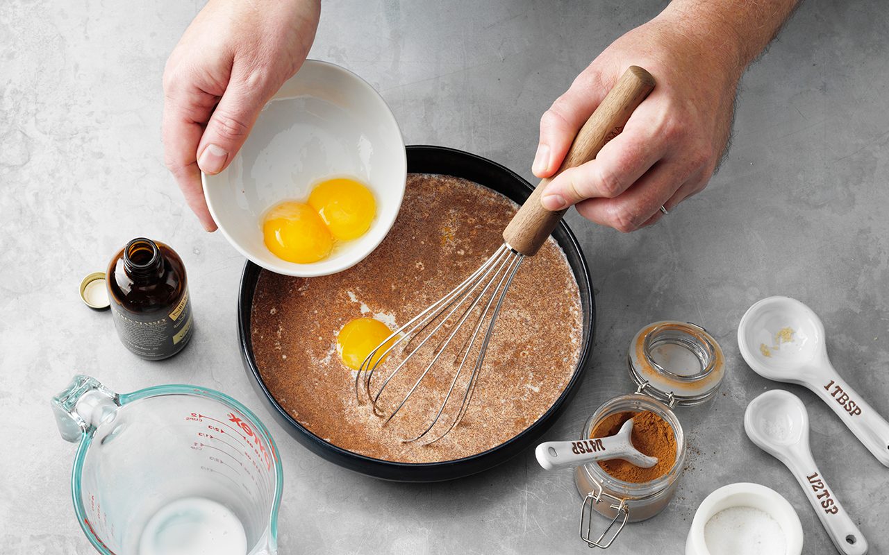 how to make french toast The Best French Toast; How to Step 1; Whisk together first 7 ingredients; half-and-half cream; egg yolks; brown sugar; vanilla extract; ground cinnamon; ground nutmeg; brioche bread; butter; maple syrup; fresh berries; whipped cream; confectioners' sugar; powder sugar; hands