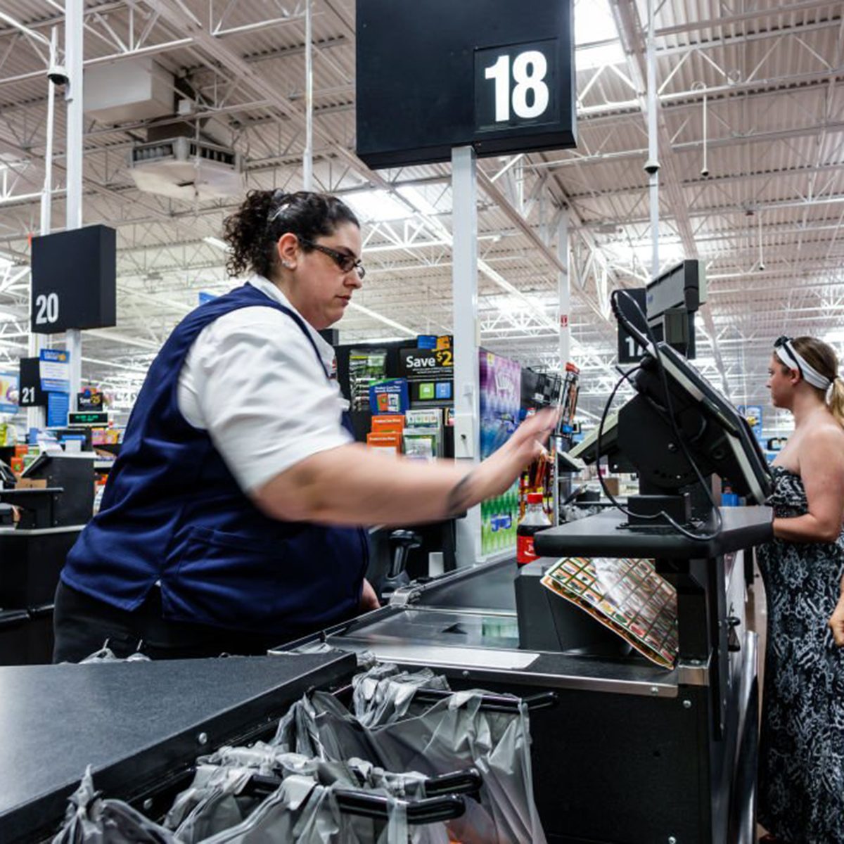 Walmart cashier checking someone out