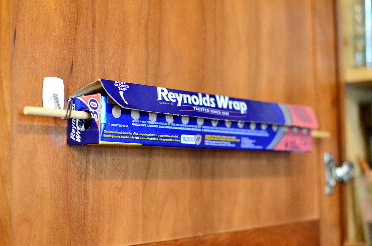 This DIY Kitchen Wrap Organizer Makes Storing Foil and Parchment Paper So Much Easier