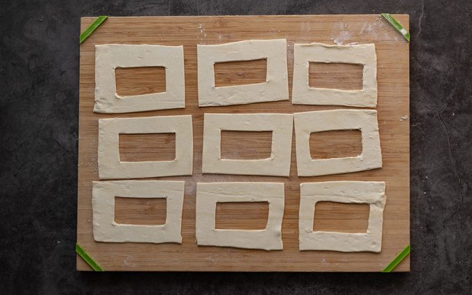 Rectangles of puff pastry dough with rectangular cutouts in the centers. starbucks cheese danish copycat