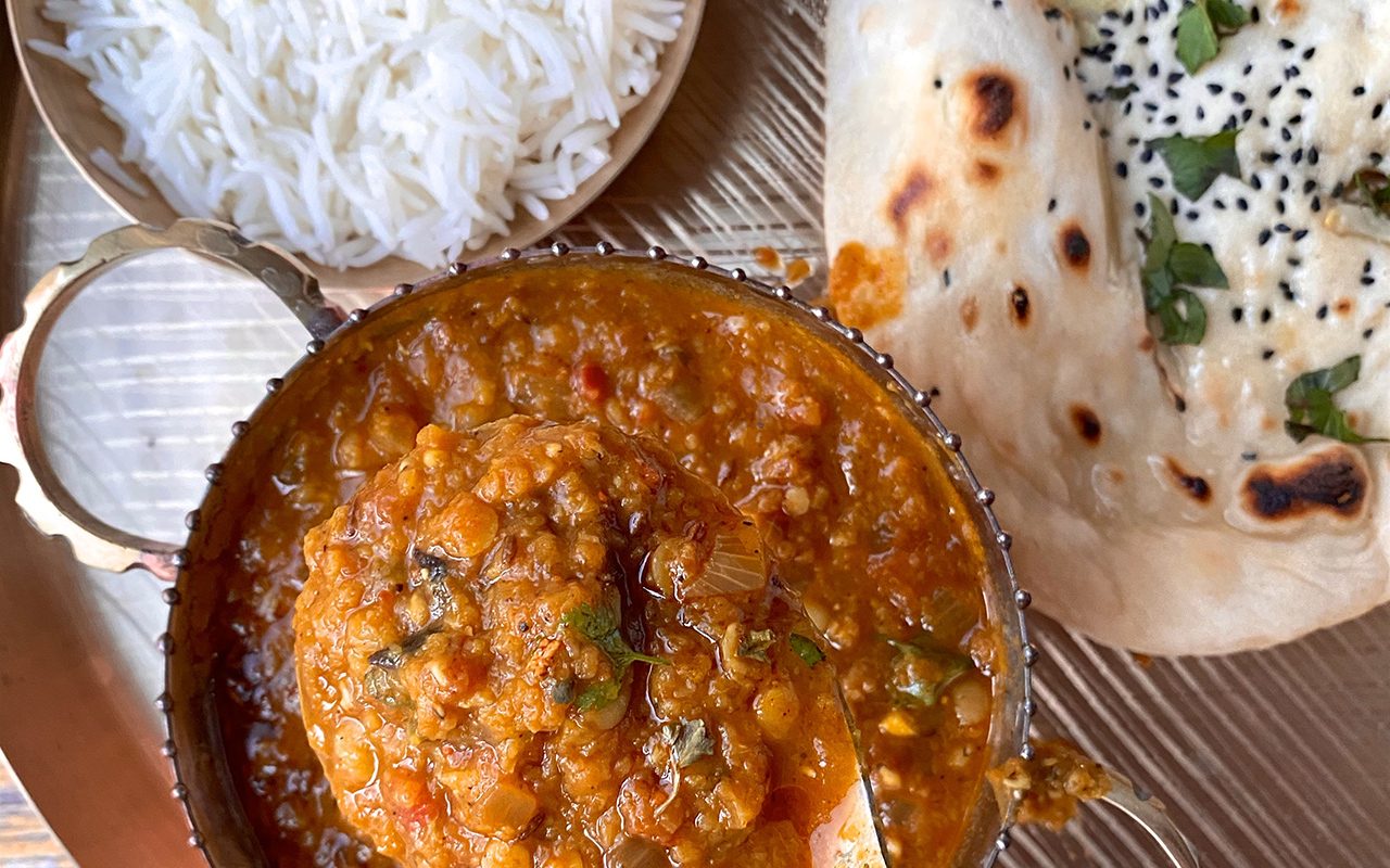 A platter of Dal, rice, & naan