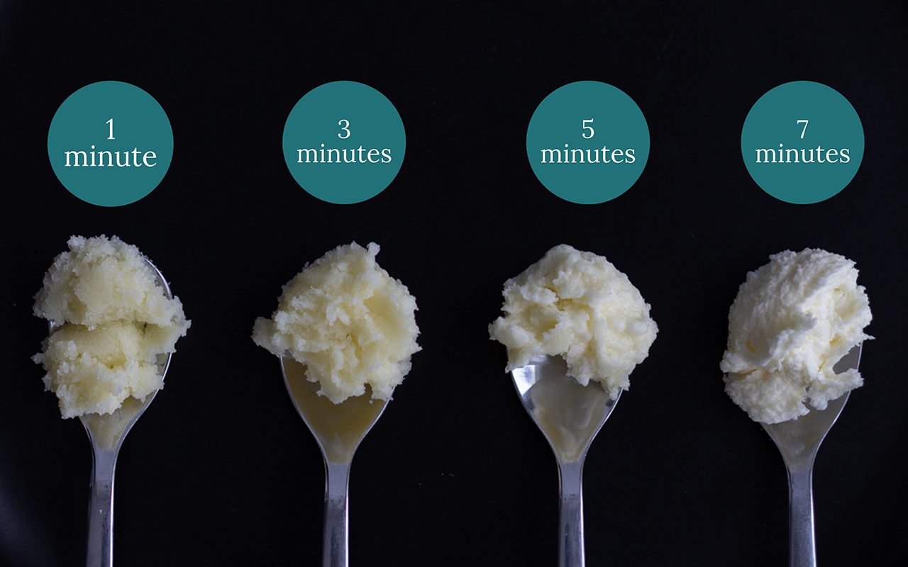 Butter-sugar mixture on four spoons with graphics above. how to cream butter and sugar