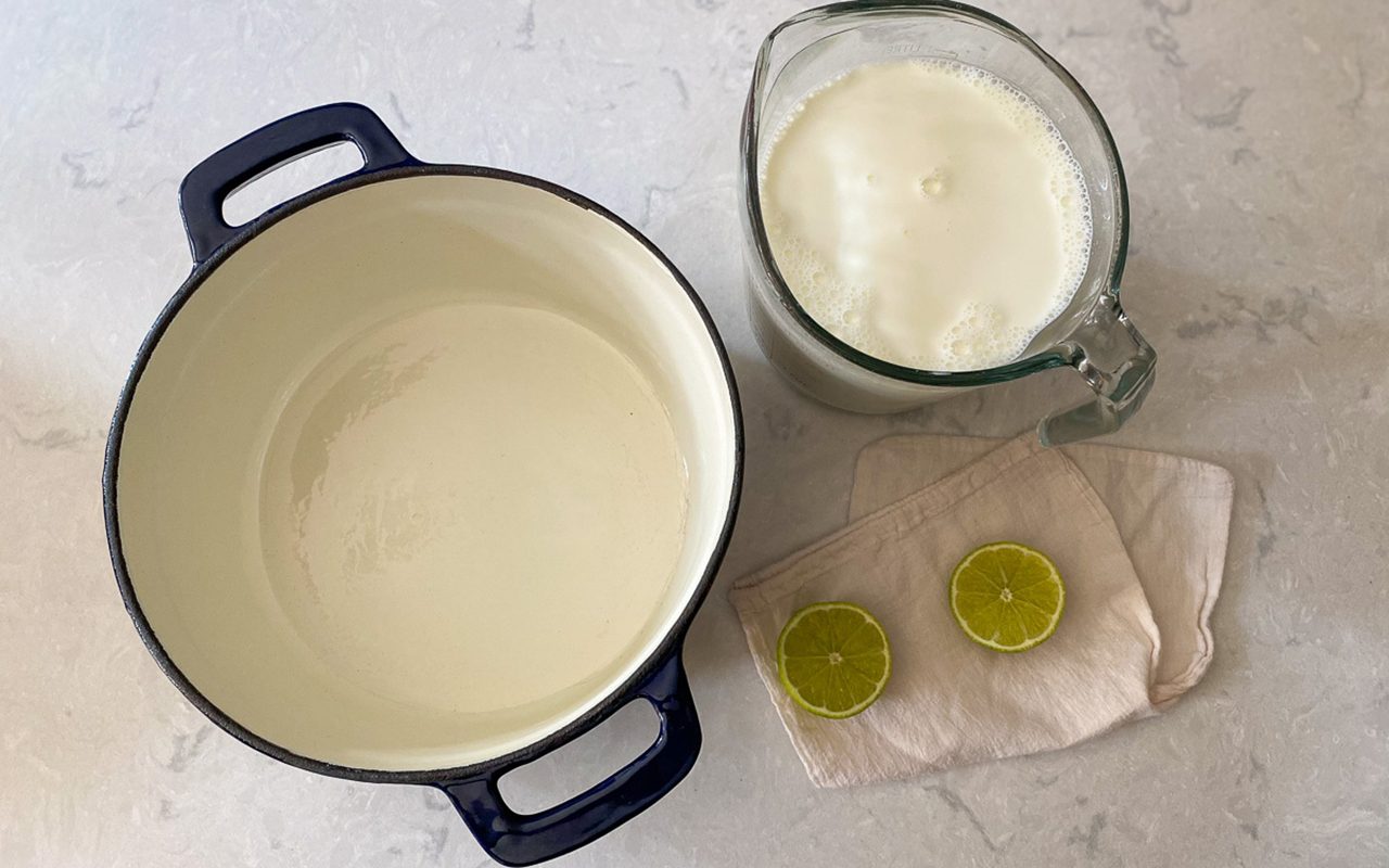 dutch oven, cheese bag, cut lemons and milk