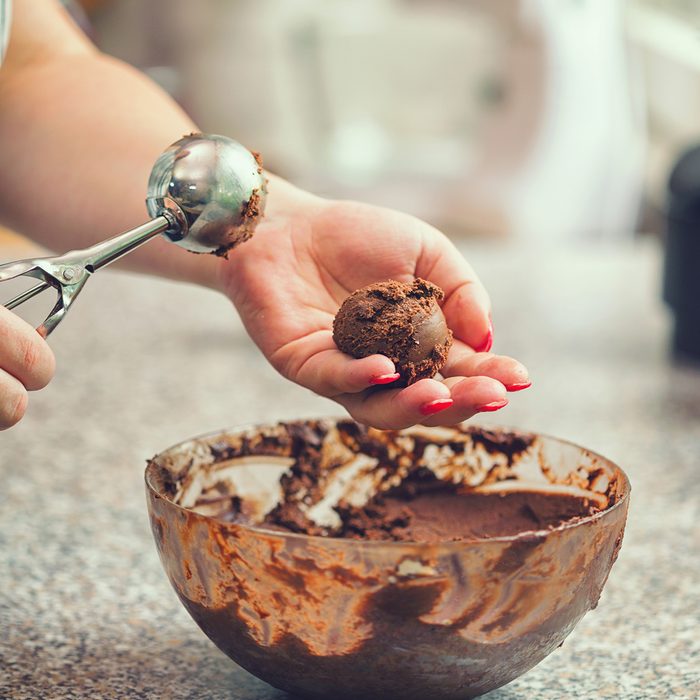 Young Woman Preparing Chocolate Truffles