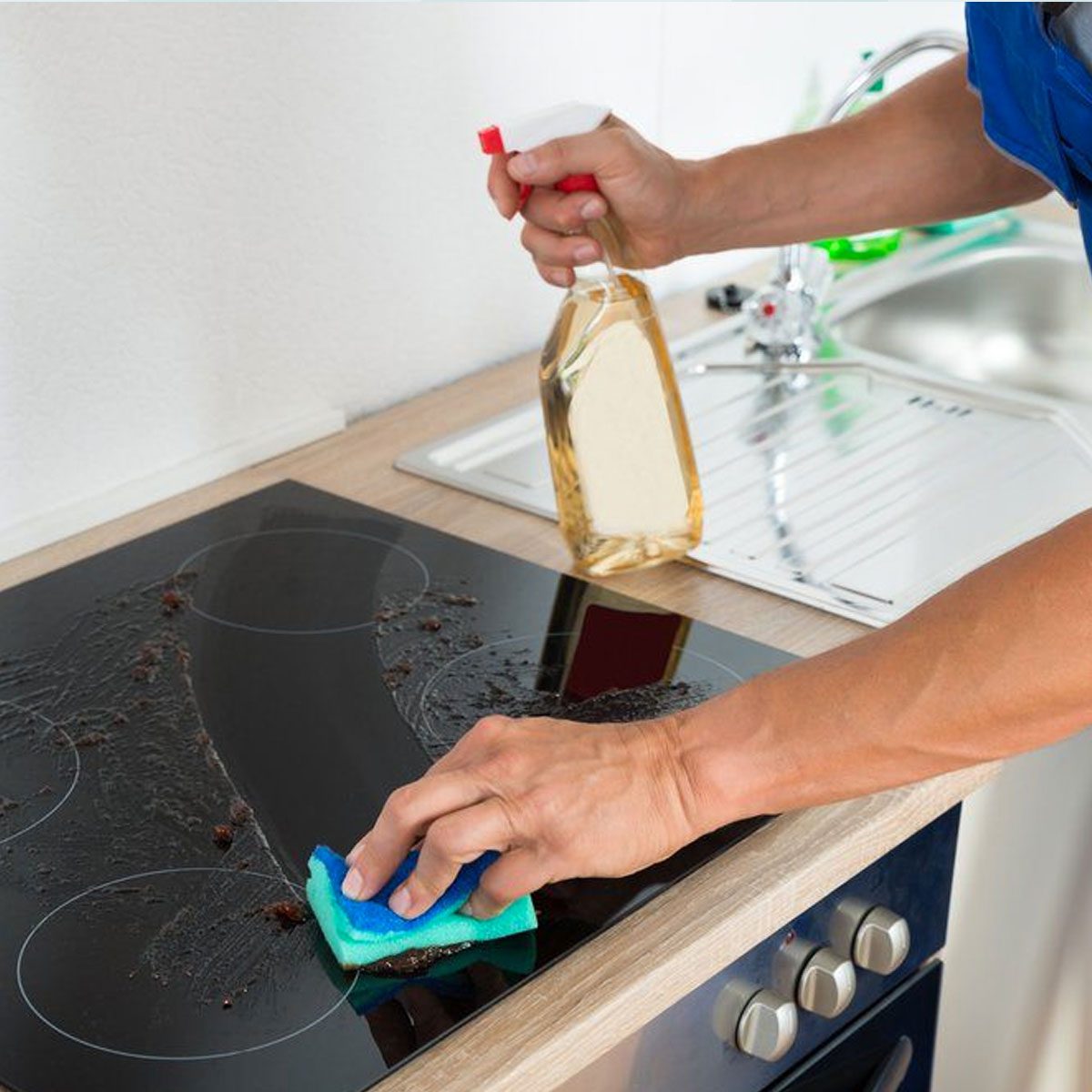 Wiping Stove Shutterstock 336272756