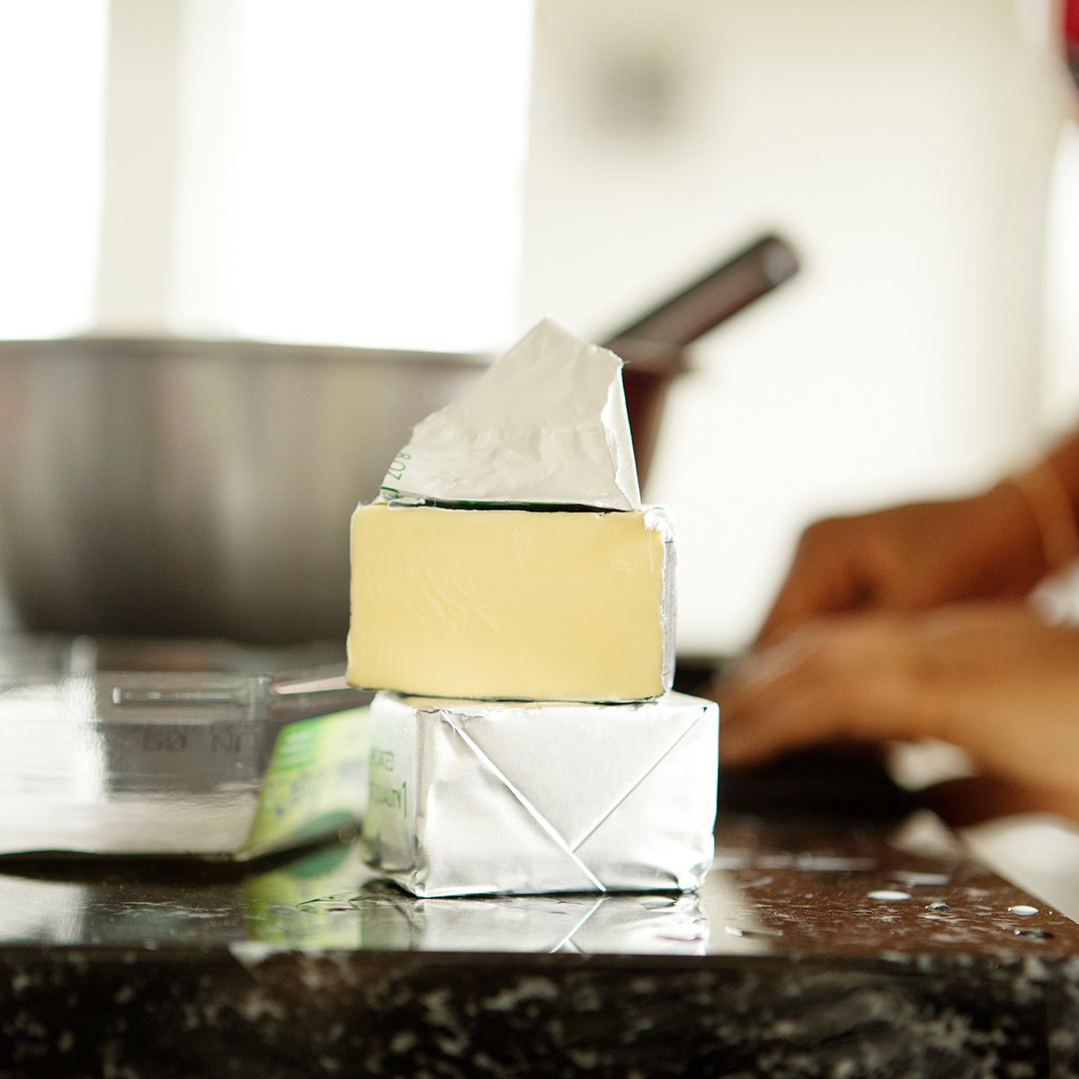 Midsection Of Woman Preparing Food