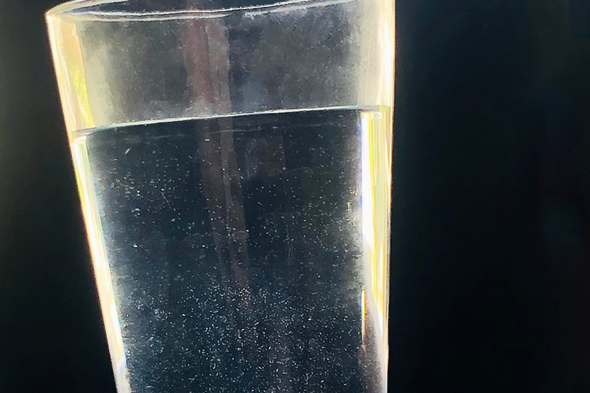 If You See White Flakes in Water from Your Tap, This Is What It Means